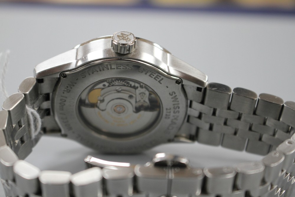 A gentlemans modern Raymond Weil stainless steel automatic wrist watch, on Raymond Weil stainless steel strap.